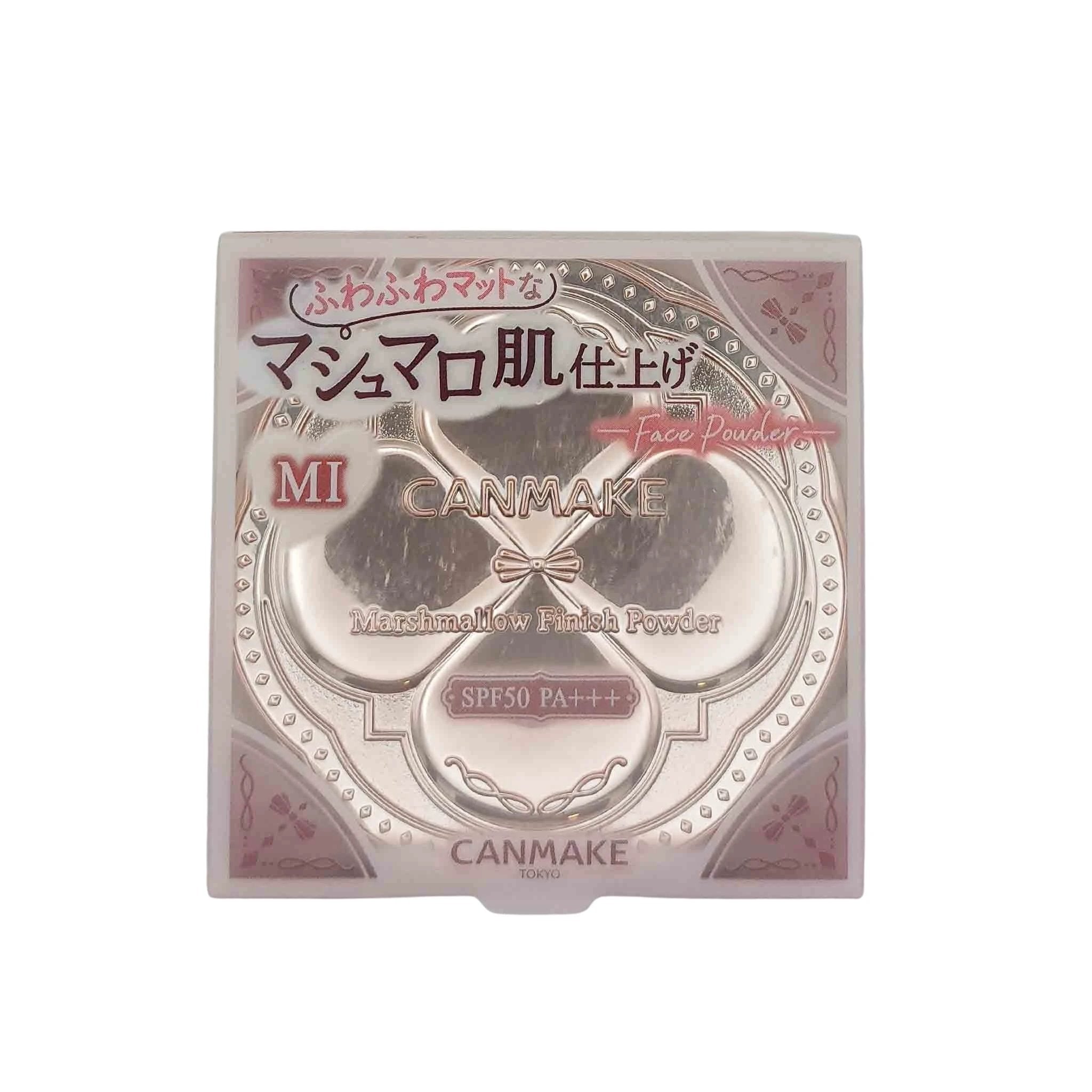 Pink metallic square compact with circular powder wells, CANMAKE Marshmallow Finish Powder label and SPF50 PA+++