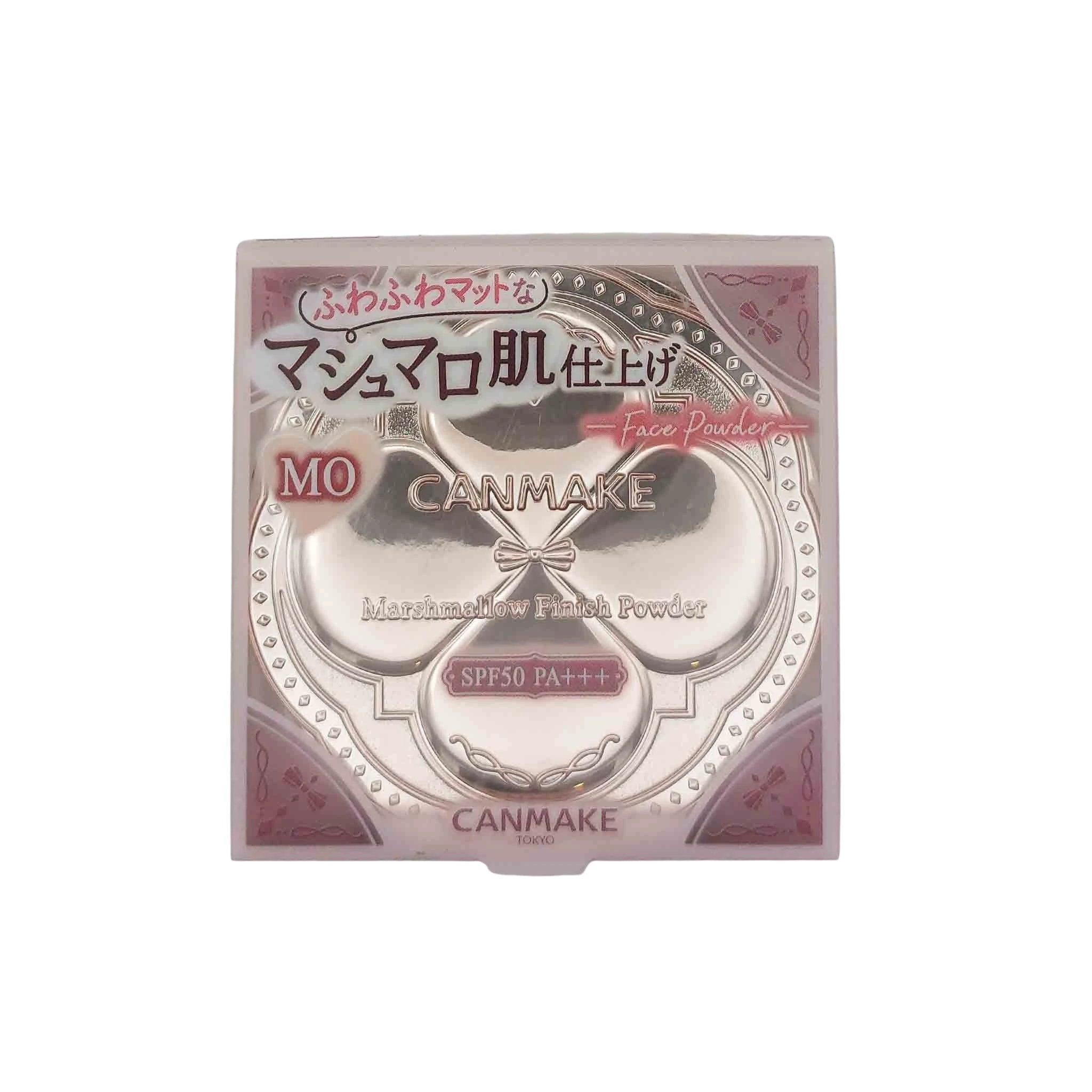 Pink metallic Canmake compact with three circular powder pans, Marshmallow Finish Powder SPF50 PA+++ label, bow motif.