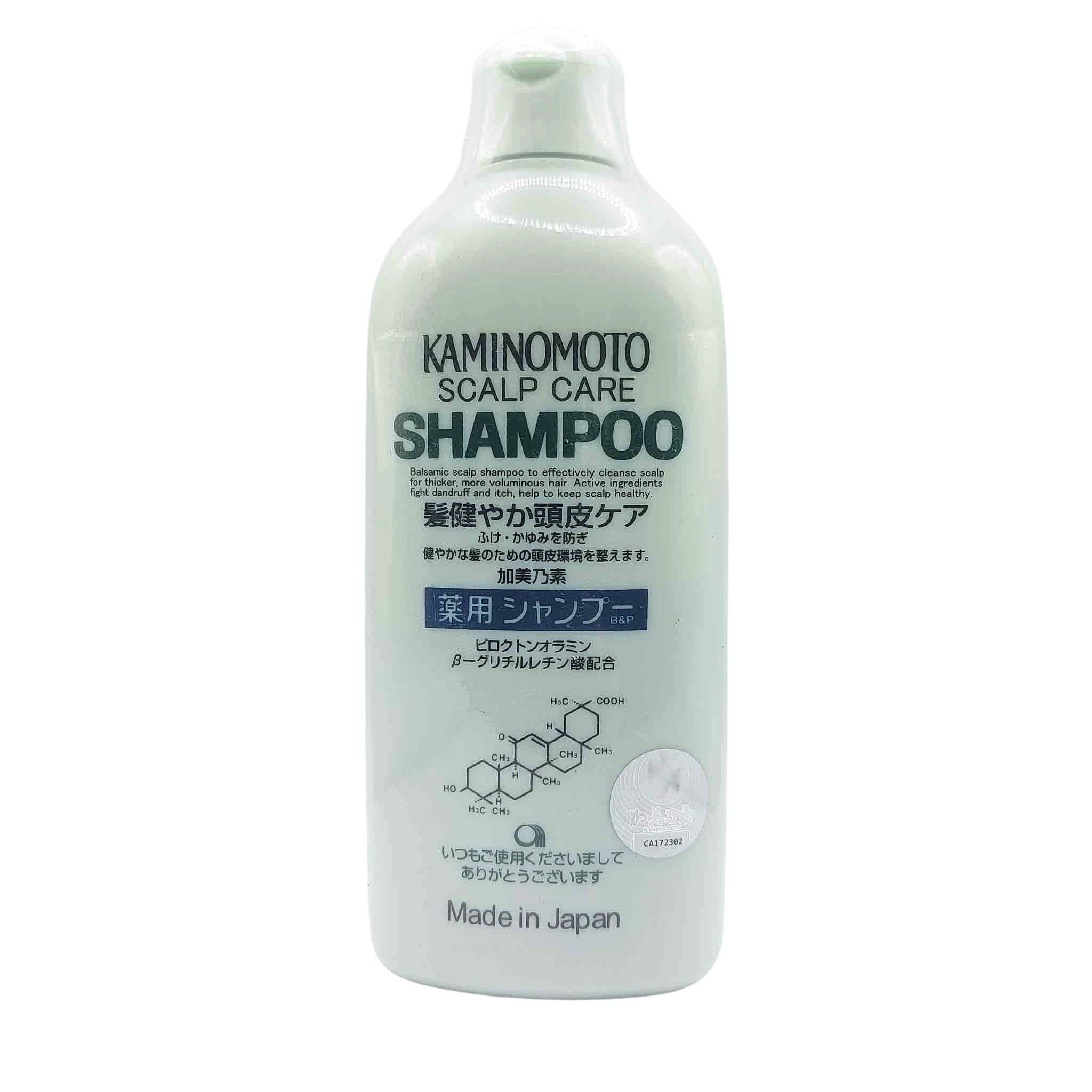 Mint-green plastic shampoo bottle with a white flip-top cap, bold Kaminomoto Scalp Care Shampoo label and a small chemical diagram.