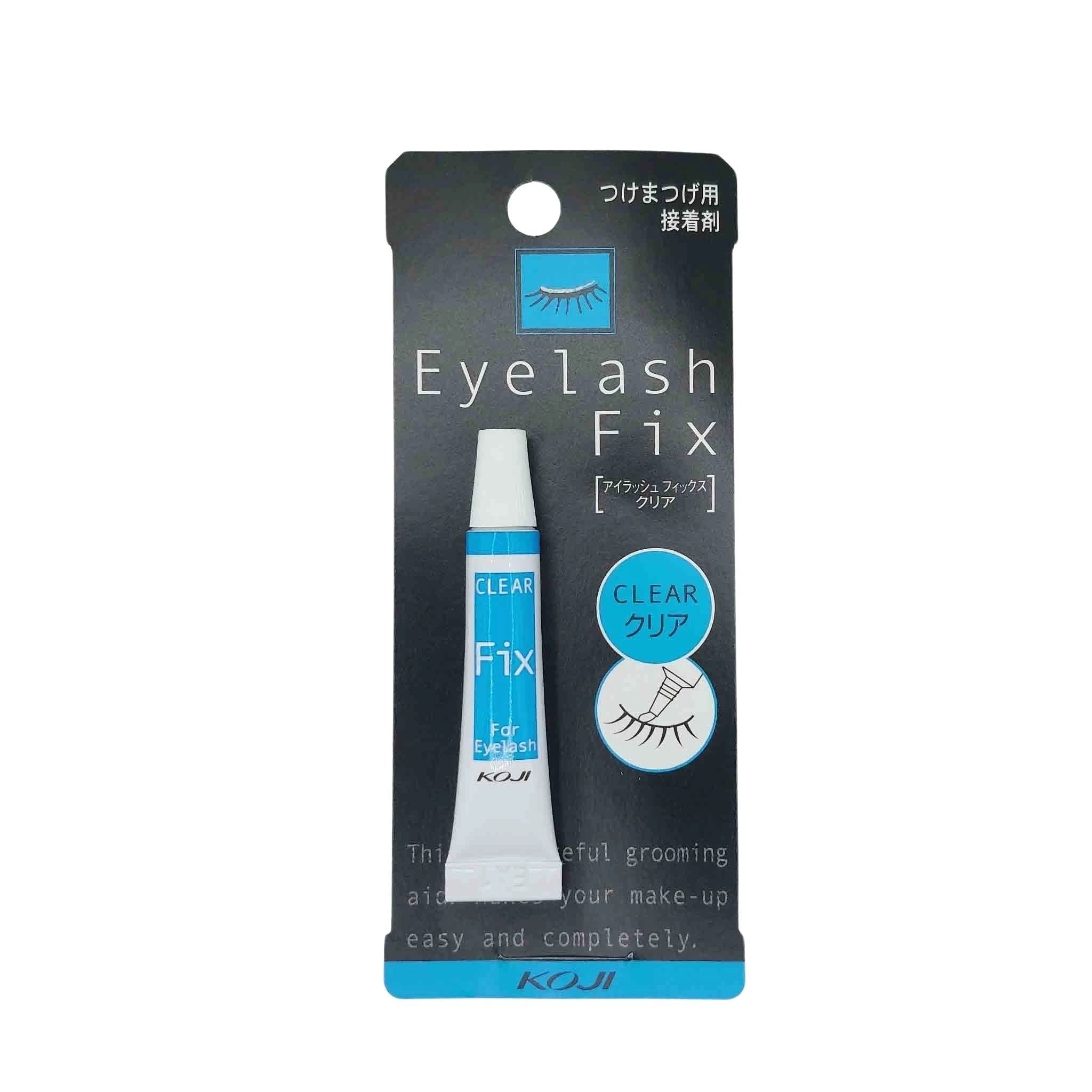 White Koji Eyelash Fix glue tube with blue label and white cap on a dark gray card; blue CLEAR circle and eye icon.