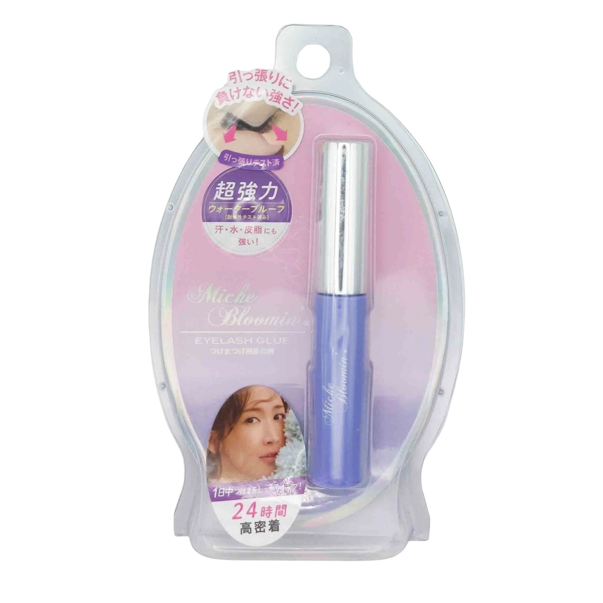 Blue-purple Miche Bloomin' eyelash glue bottle with silver cap in a clear oval blister pack, pink gradient backdrop and model photo.