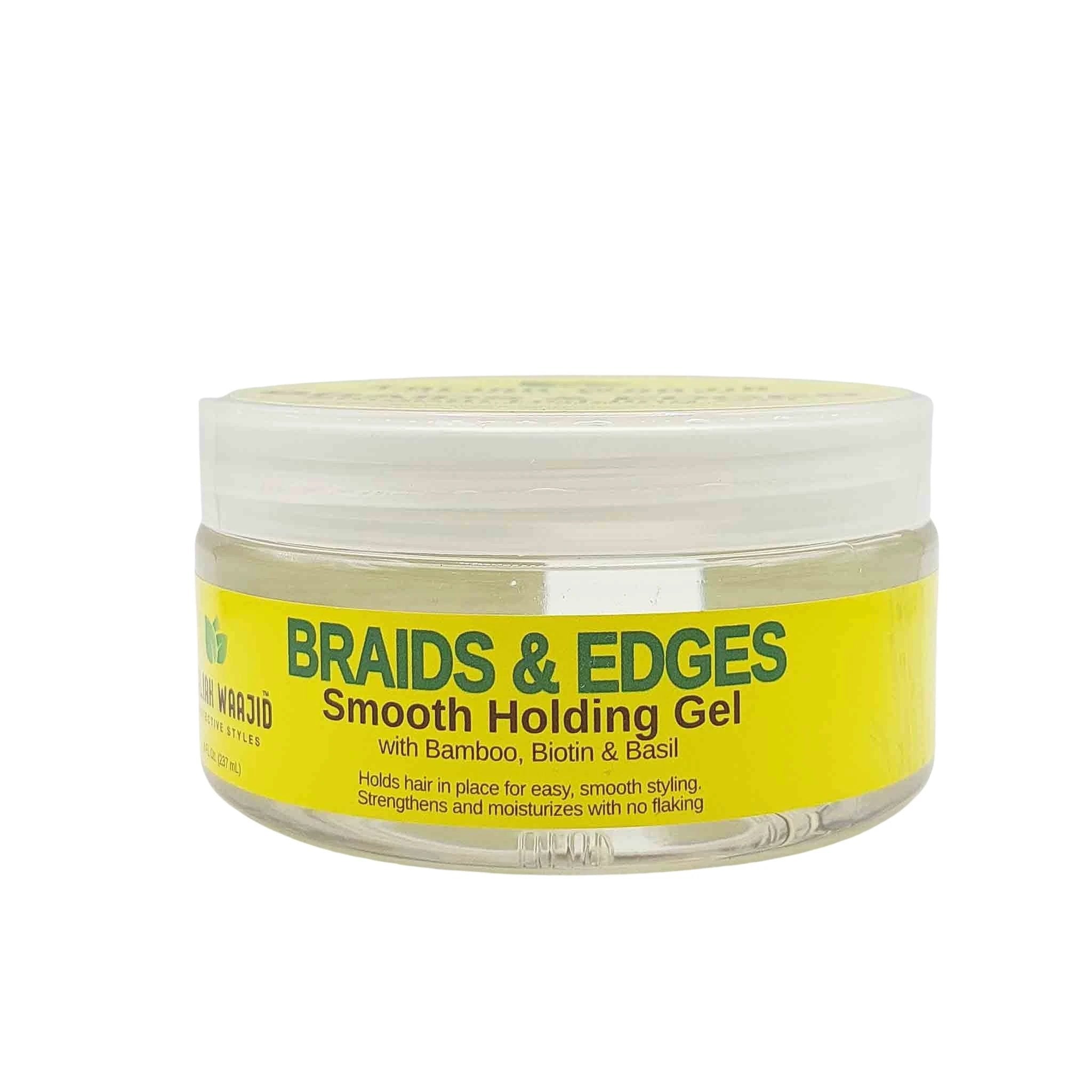Clear jar with white lid and a bright yellow label reading BRAIDS & EDGES Smooth Holding Gel with Bamboo, Biotin & Basil.