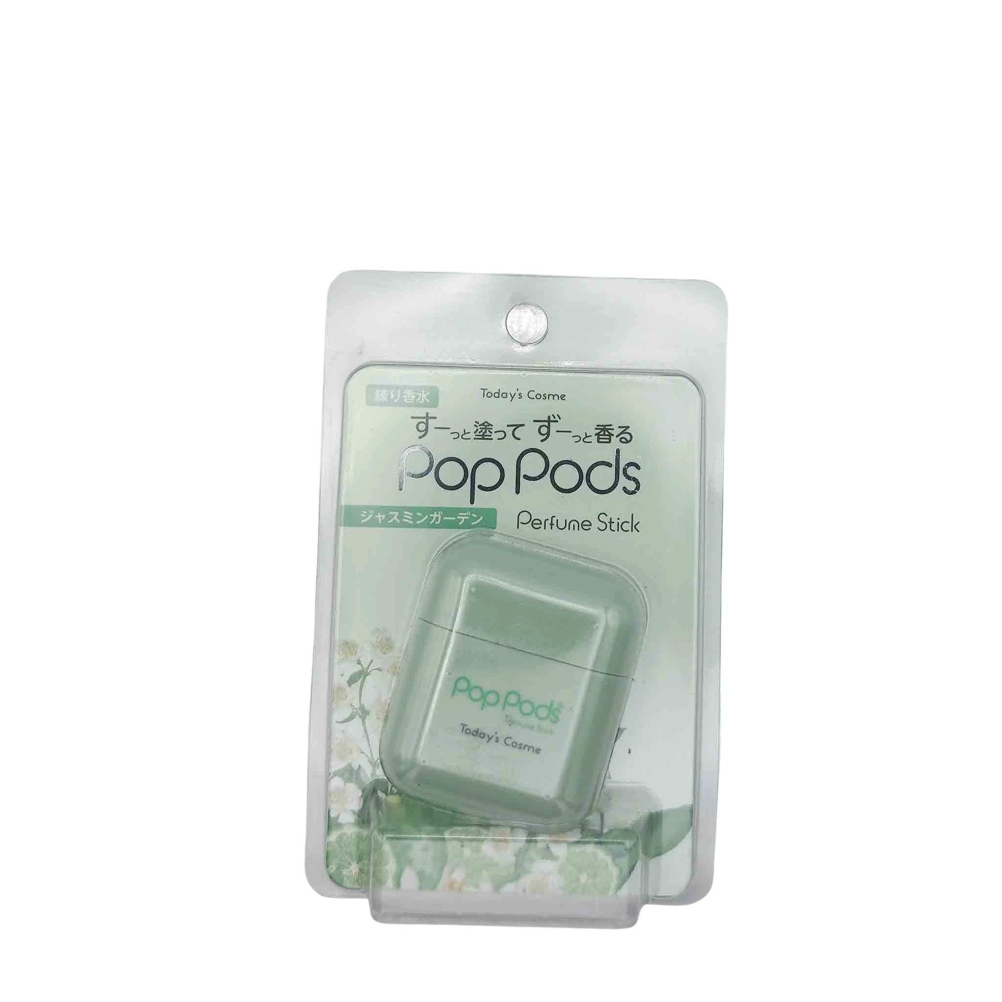 Mint-green square PopPods perfume stick in a clear blister pack with Today's Cosme branding and floral artwork.