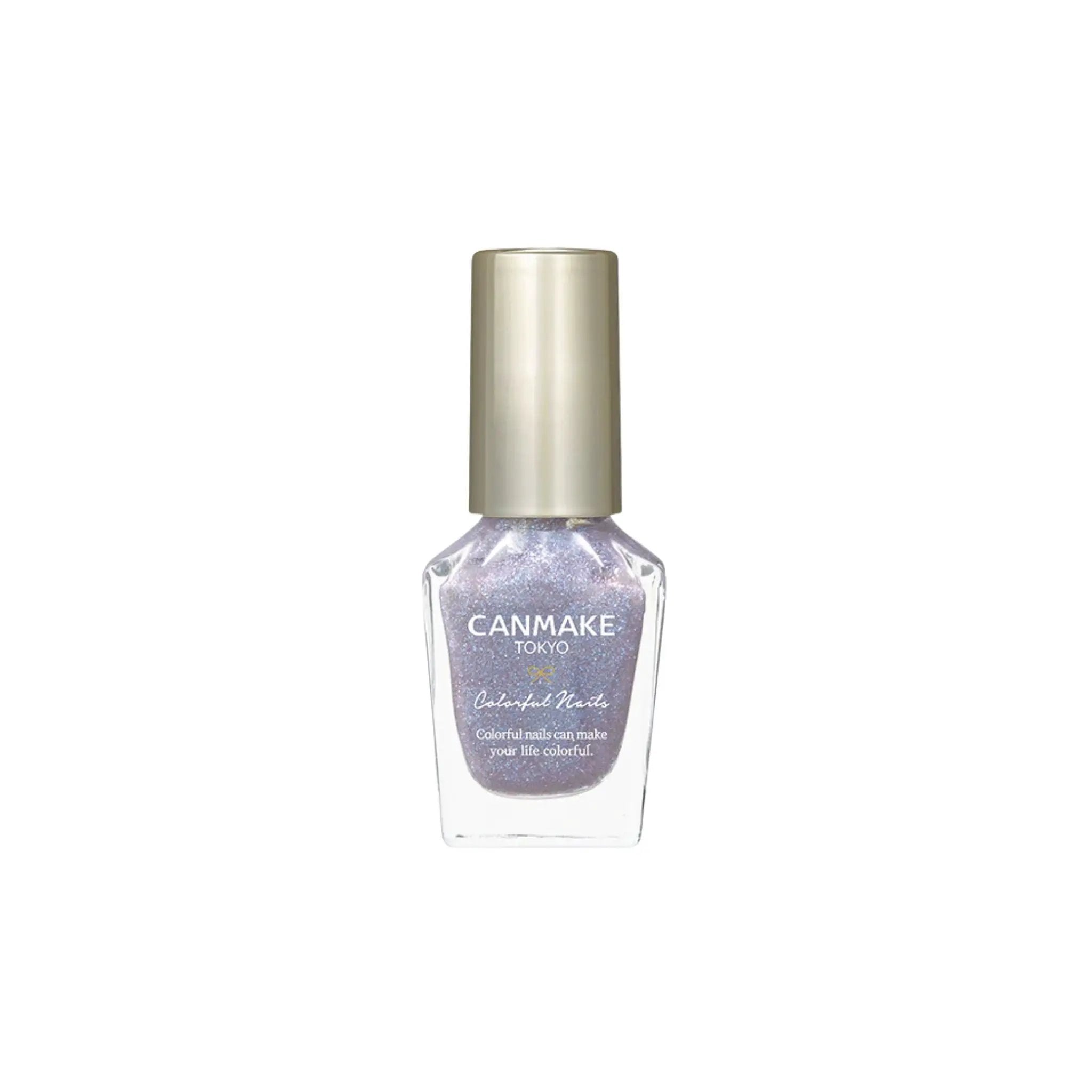 A bottle of CANMAKE Tokyo nail polish in the shade Orchidated Rhinestone, featuring a shimmering lavender-purple polish with silver glitter inside a clear glass bottle and a metallic gold cap, set against a plain white background.